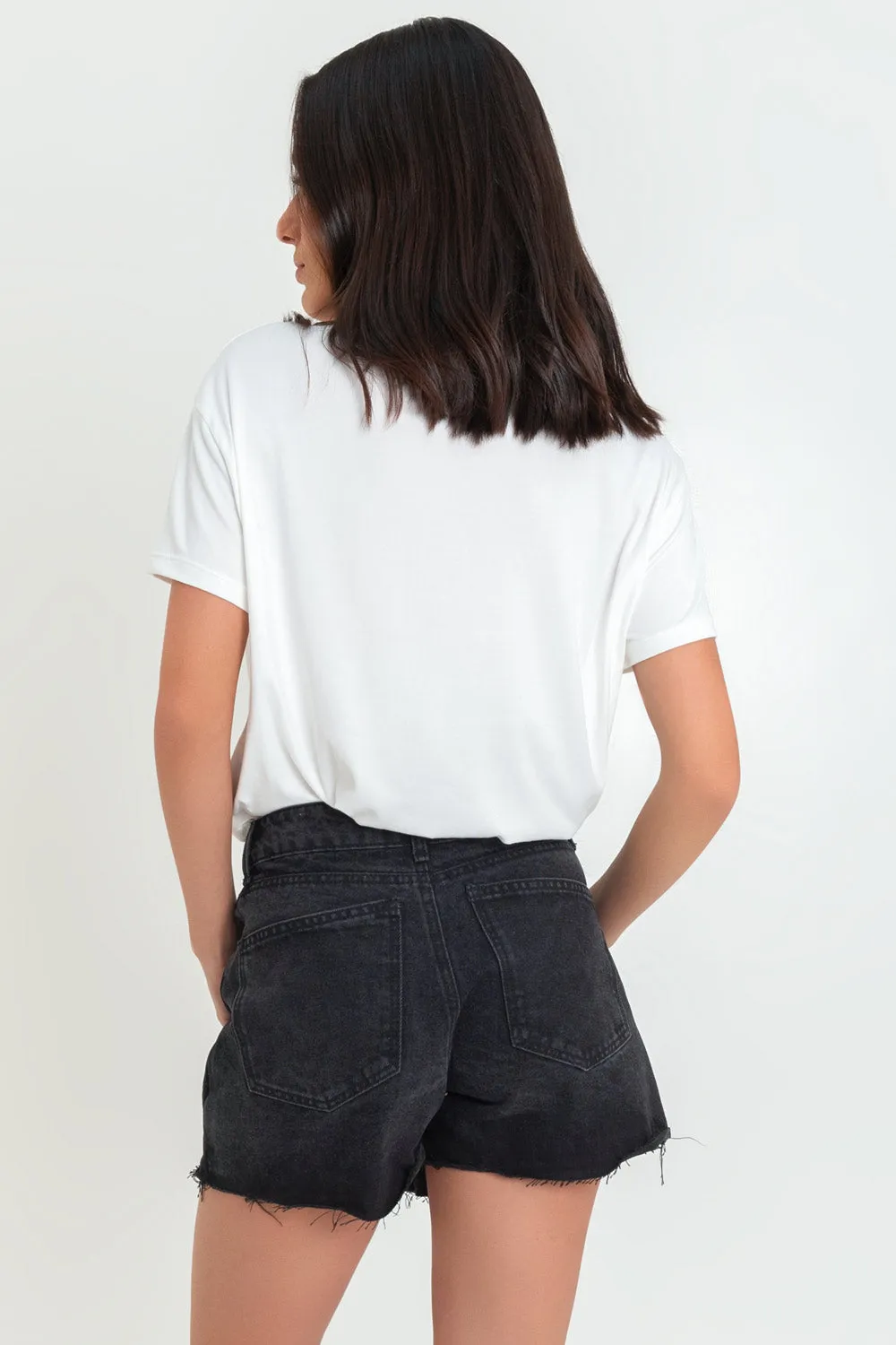 Falda short corto asimétrico de denim