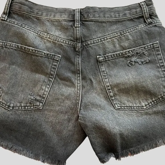 FREE PEOPLE Mid Rise Cutoff Shorts in Washed Black