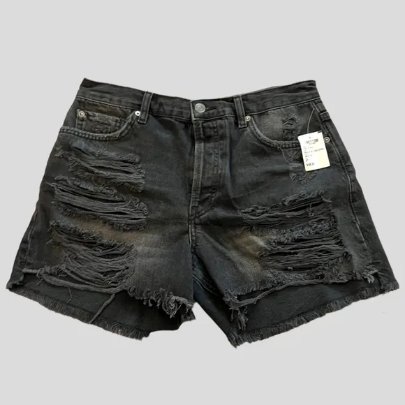 FREE PEOPLE Mid Rise Cutoff Shorts in Washed Black